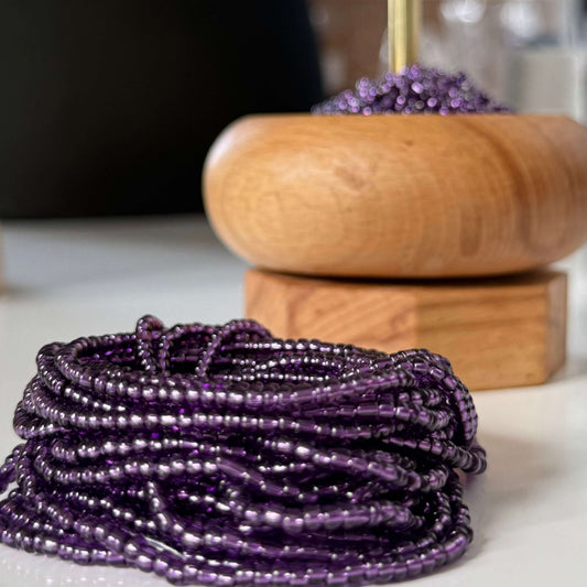 purple waist beads with clasp and tie-on options, worn as African waist beads or slimming belly beads – handmade in the UK.