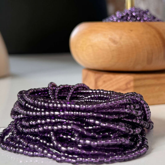 purple waist beads with clasp and tie-on options, worn as African waist beads or slimming belly beads – handmade in the UK.